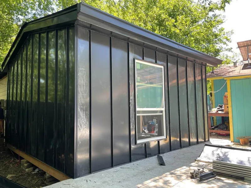 Black standing seam metal wall panels for Metal Roof Installation in Pacific